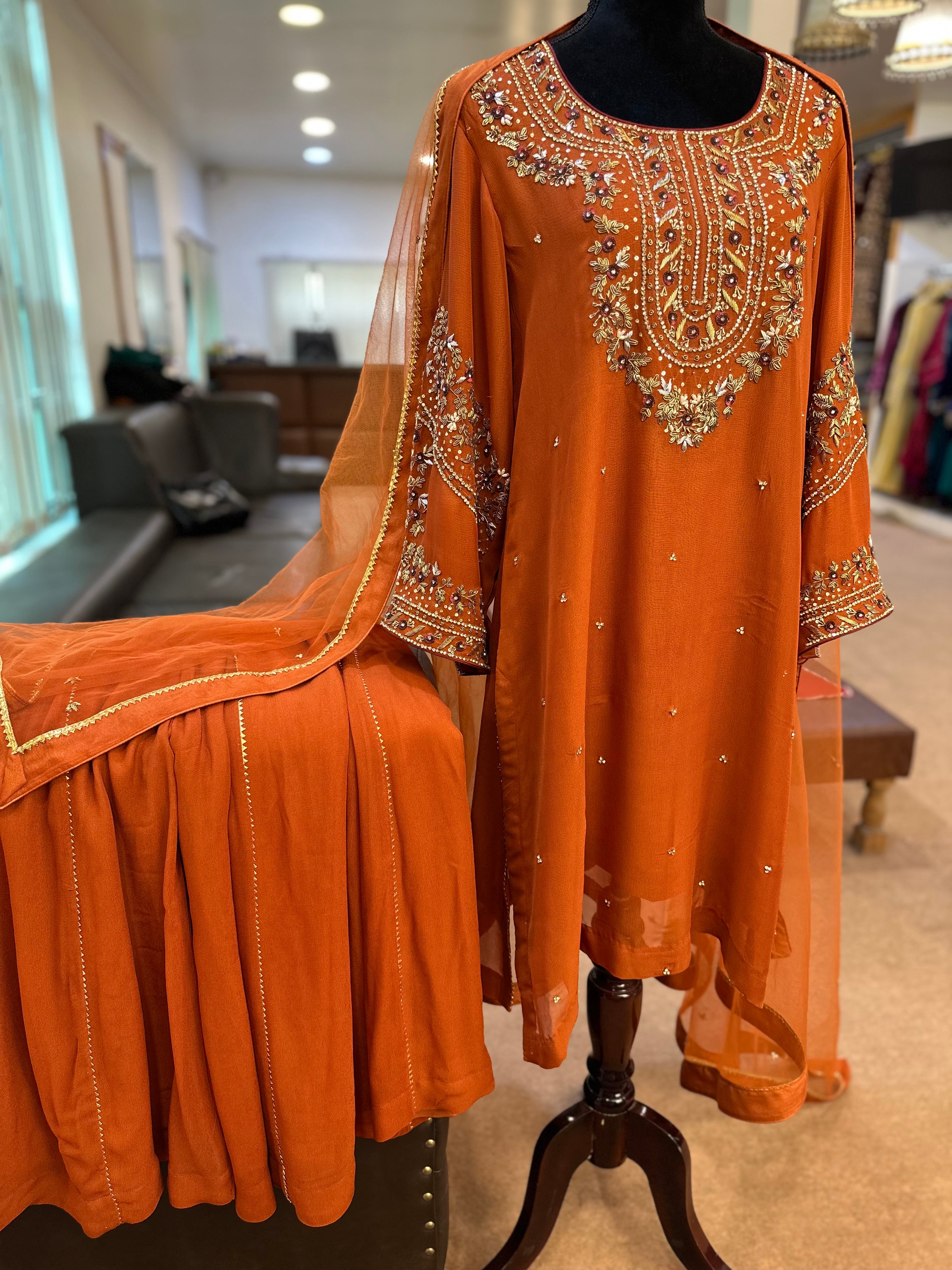 Rust georgette sharara
