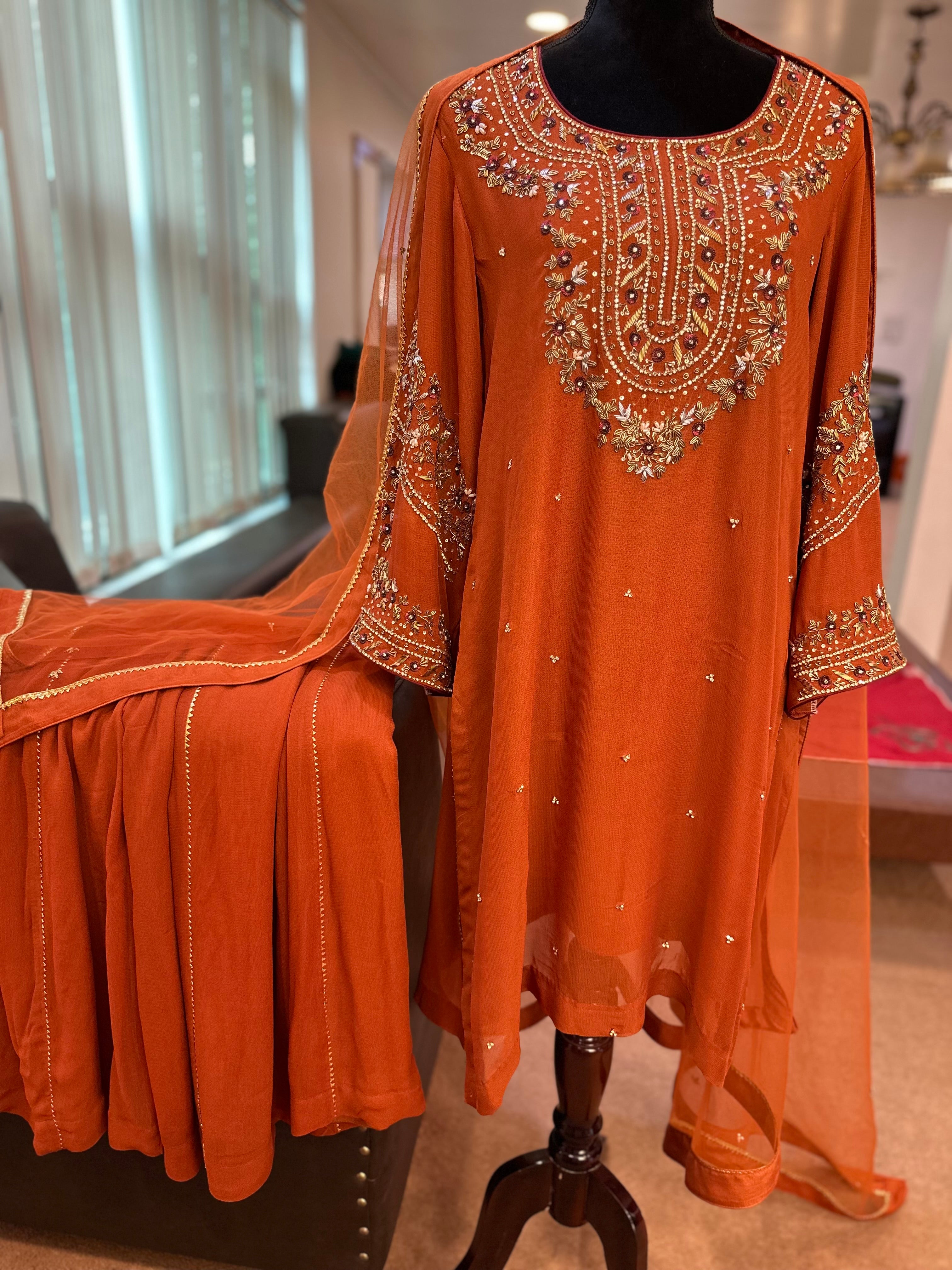 Rust georgette sharara