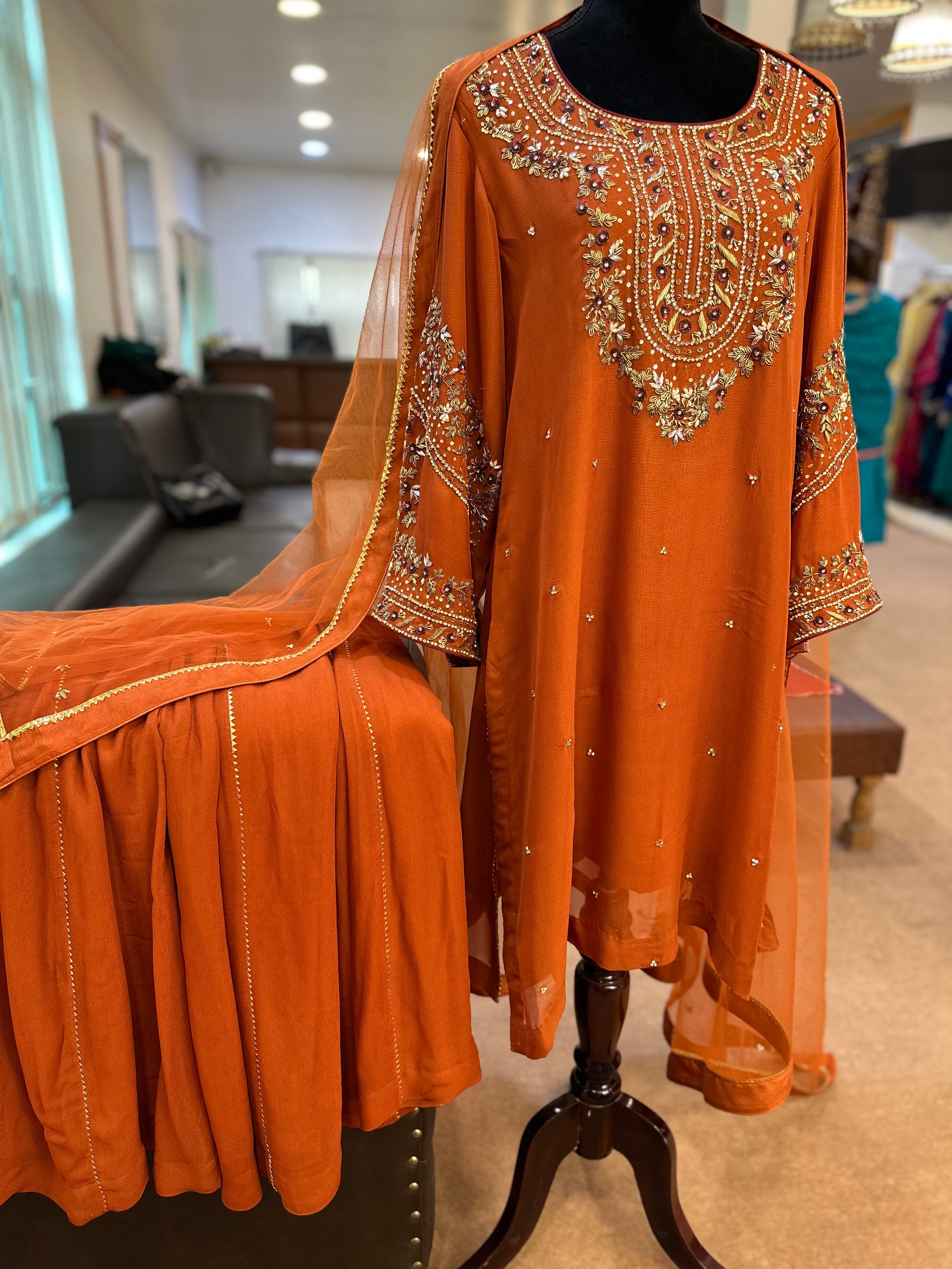 Rust georgette sharara