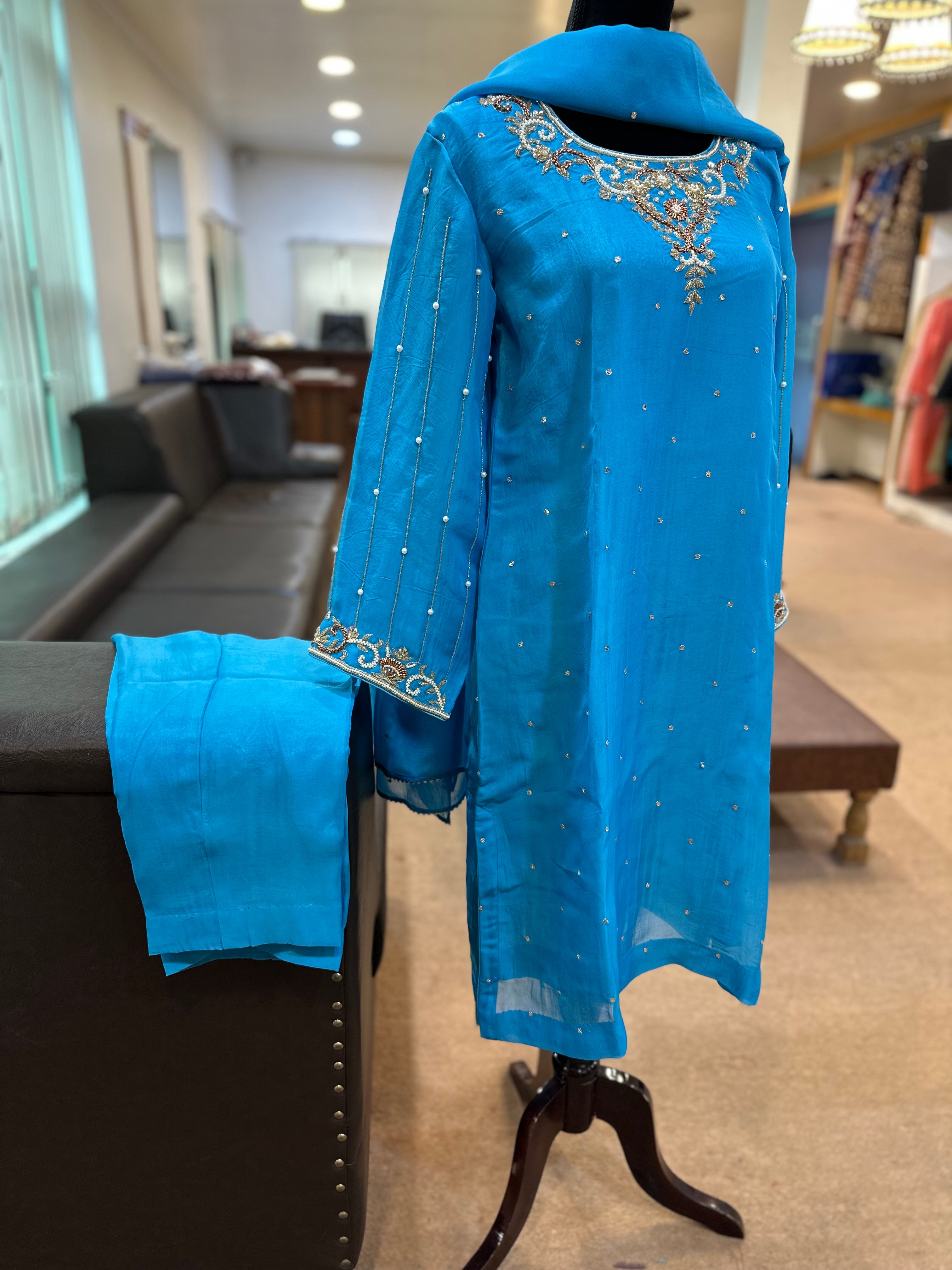 Handembroidered organza blue dress