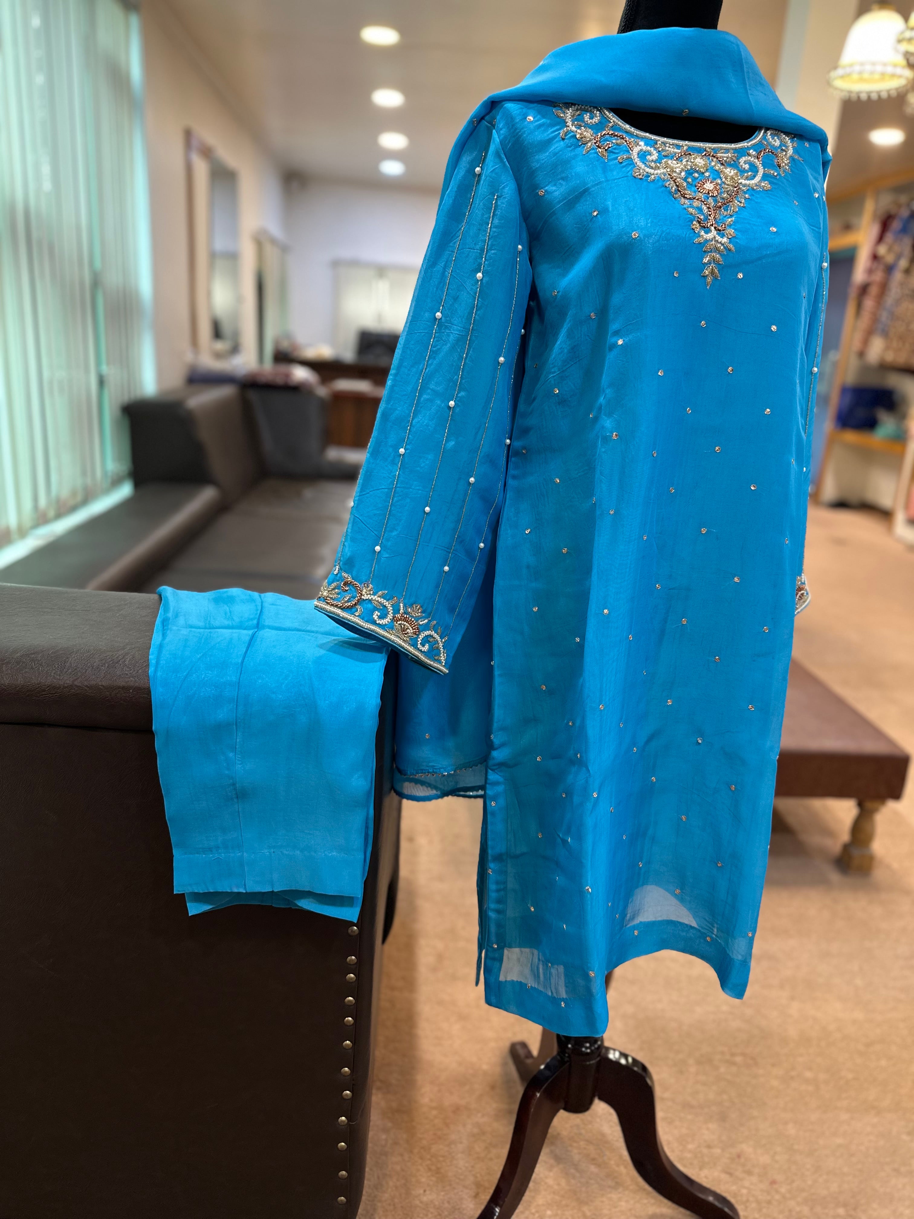 Handembroidered organza blue dress