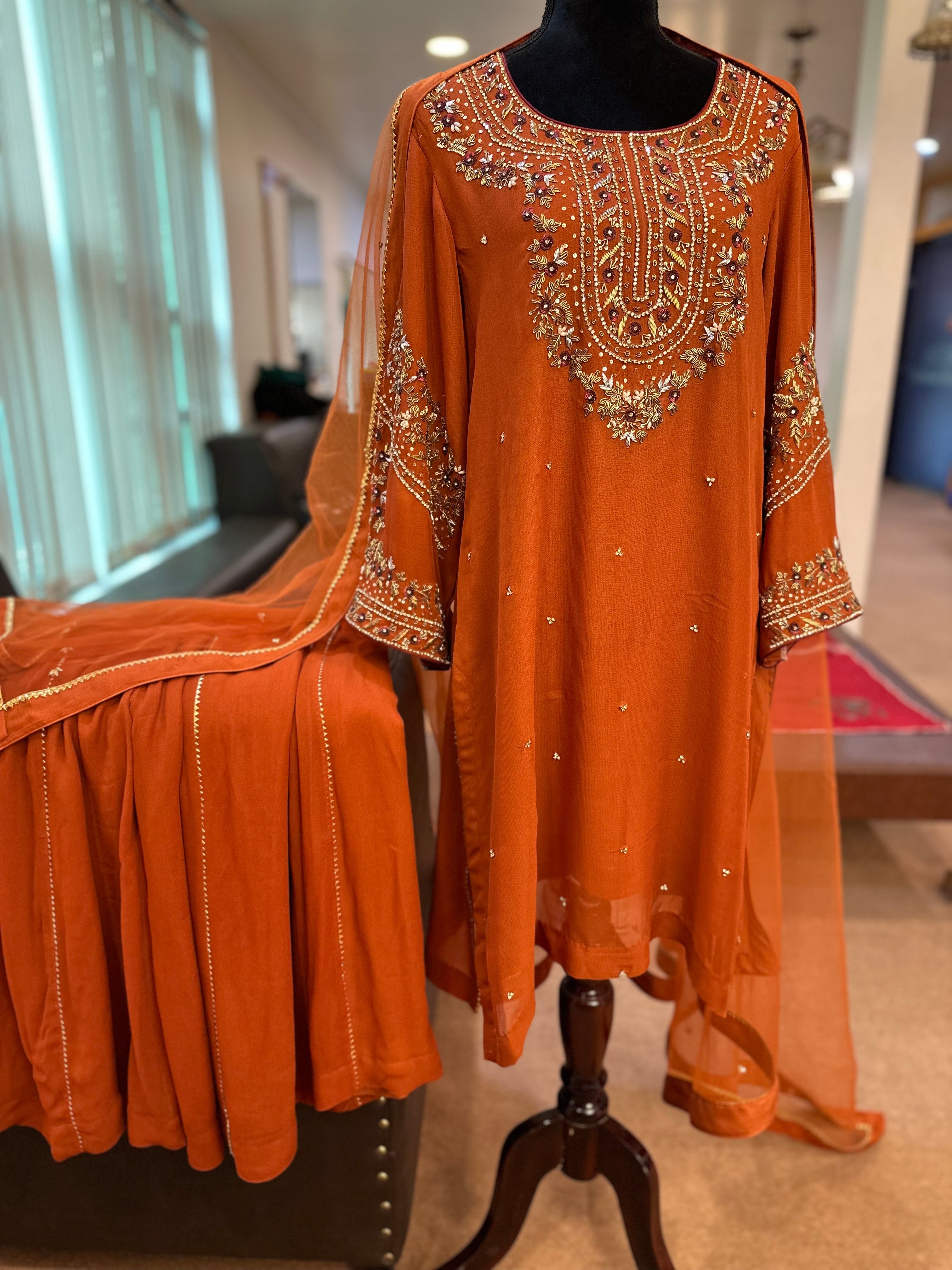 Rust georgette sharara