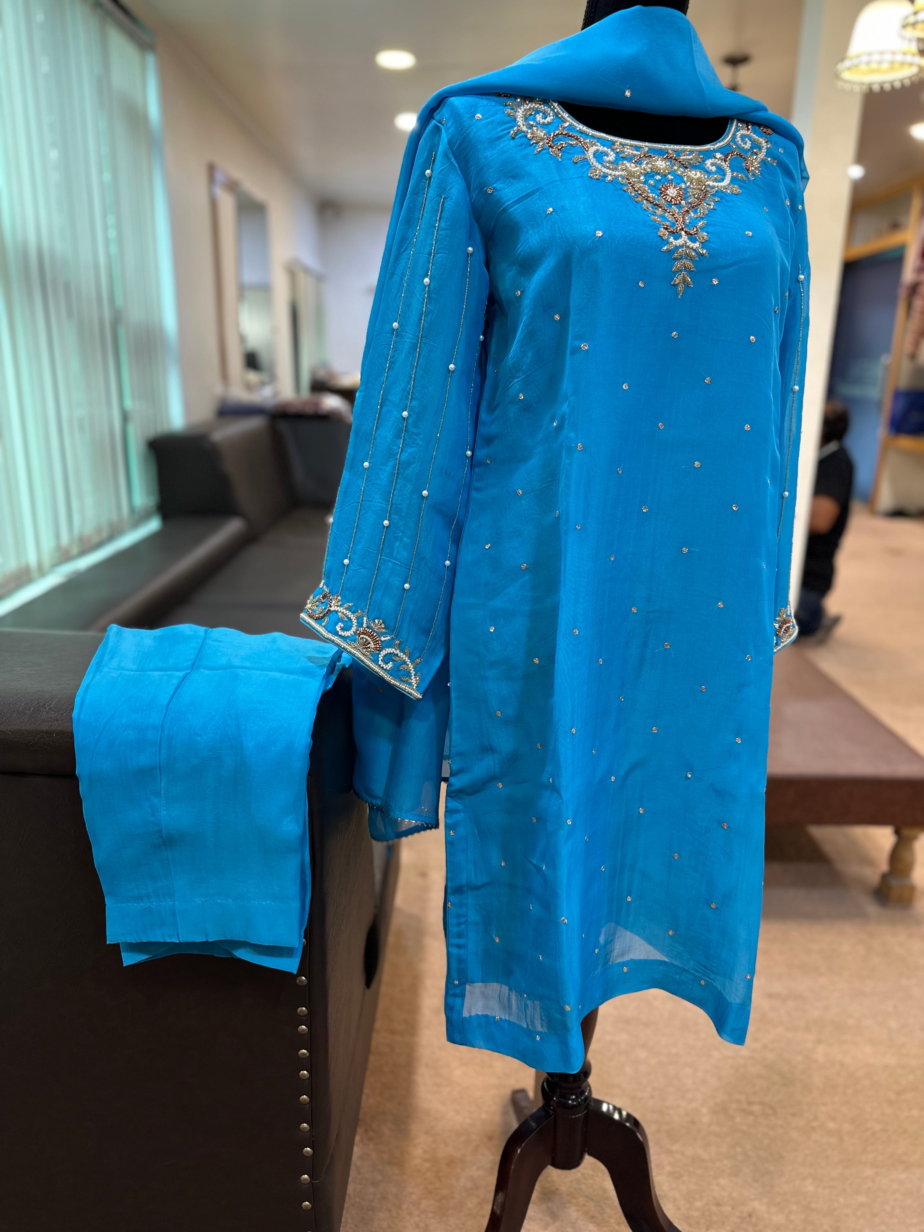 Handembroidered organza blue dress