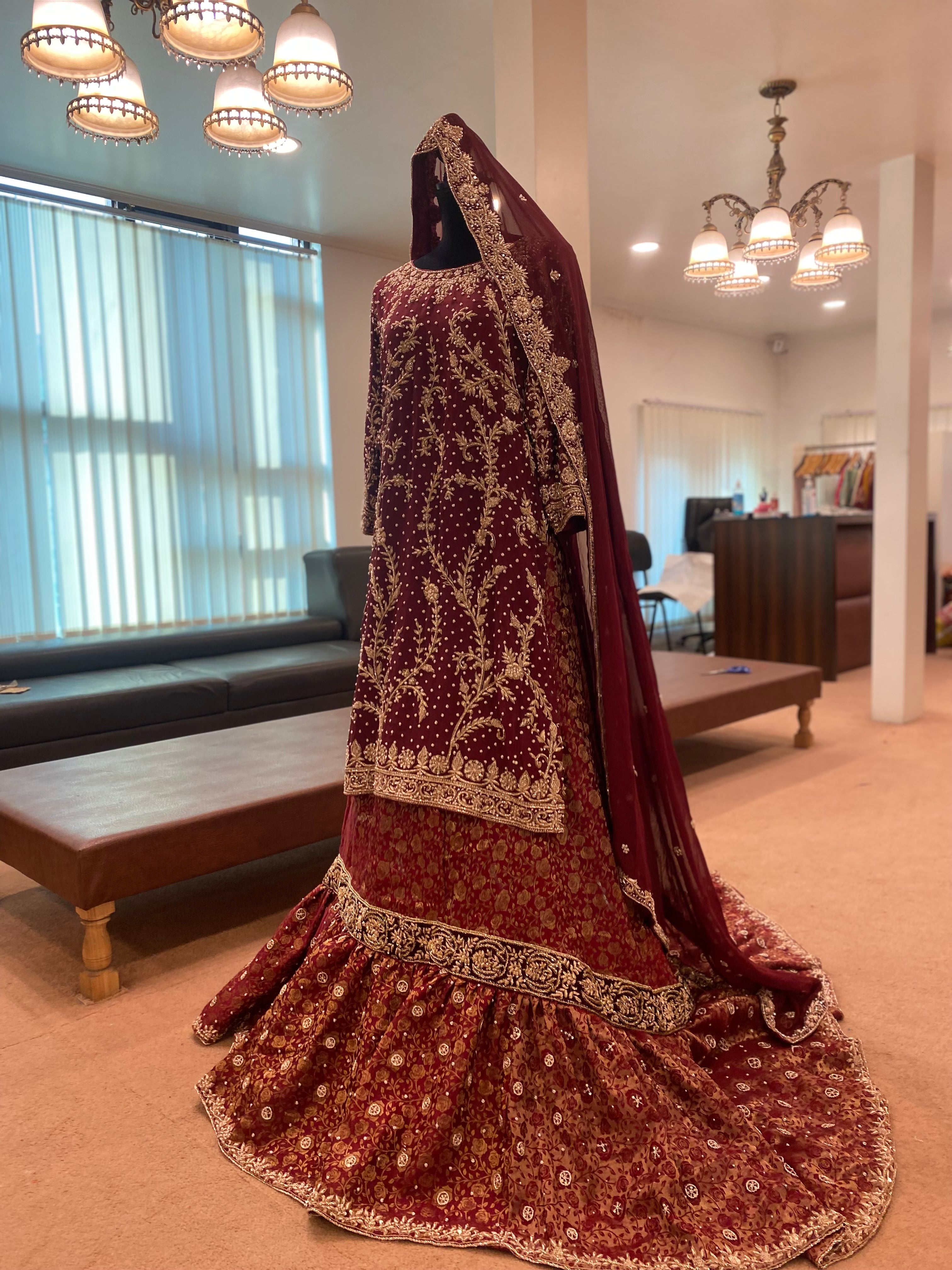 Handembroidered Bridal ensemble with trail skirt