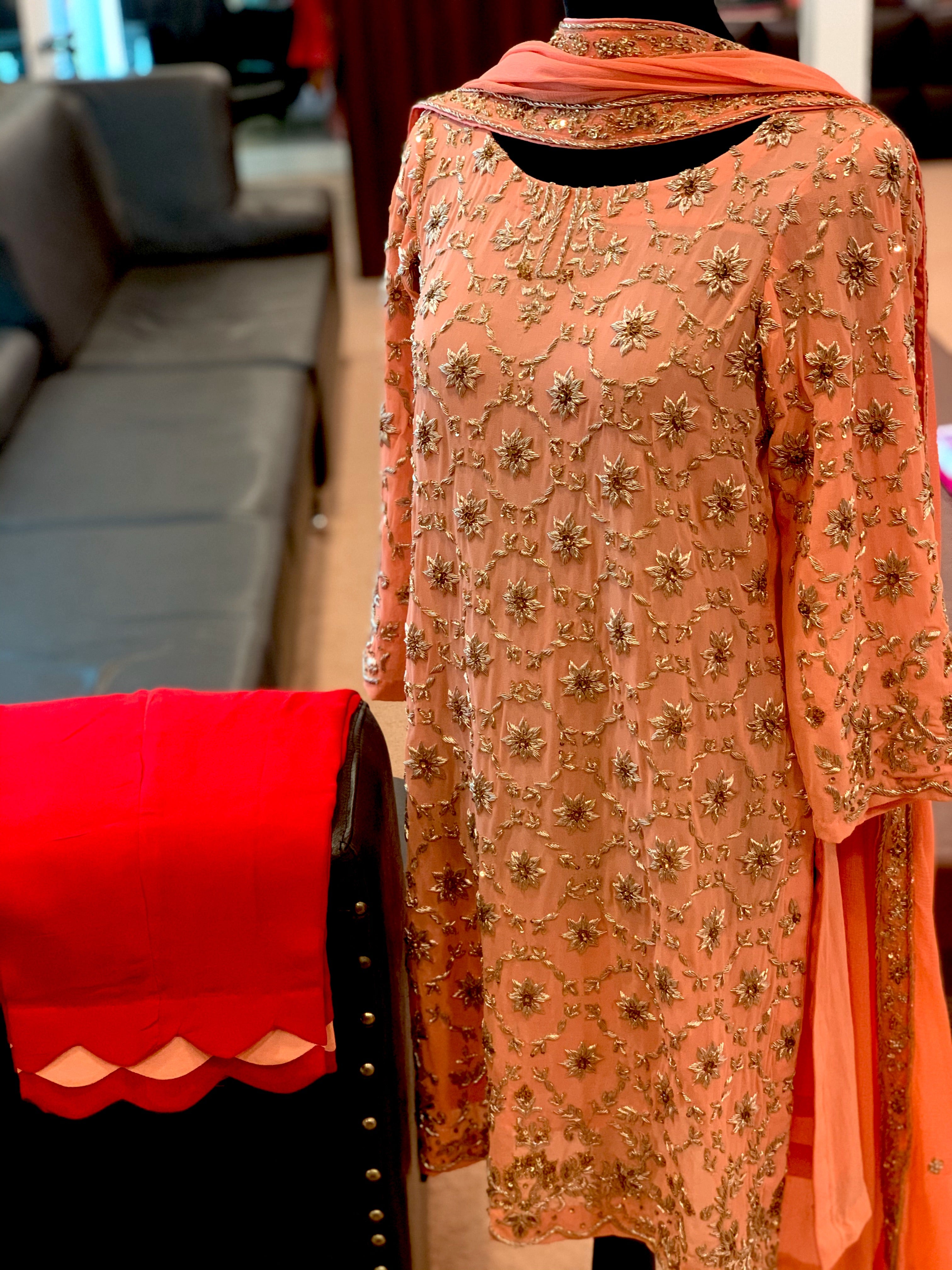 Hand embroidered suit stitched