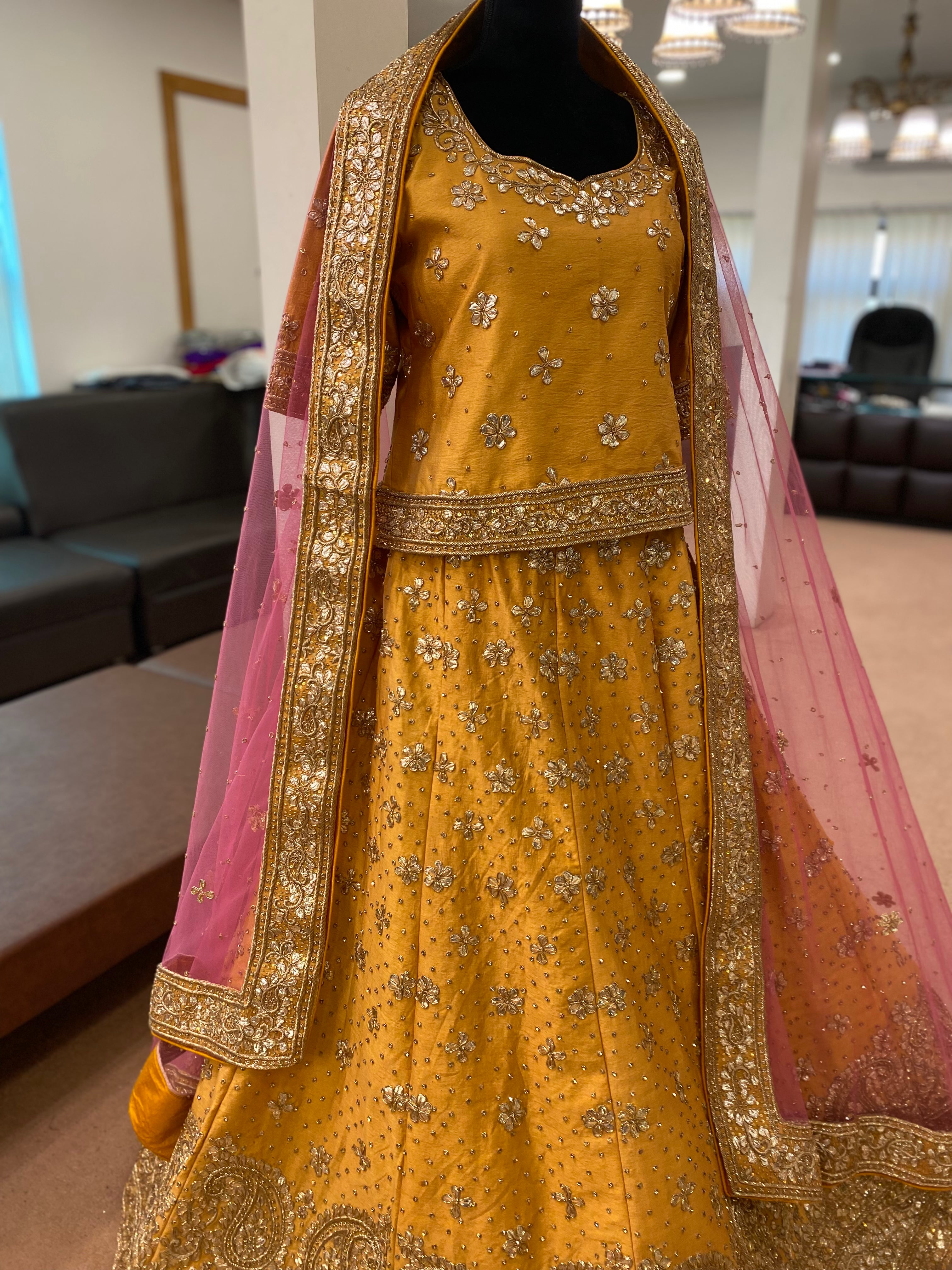Hand embroidered golden and pink lehanga