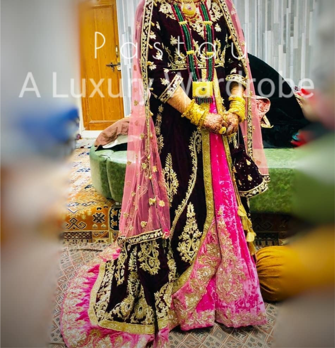 Hand embroidered trail gown