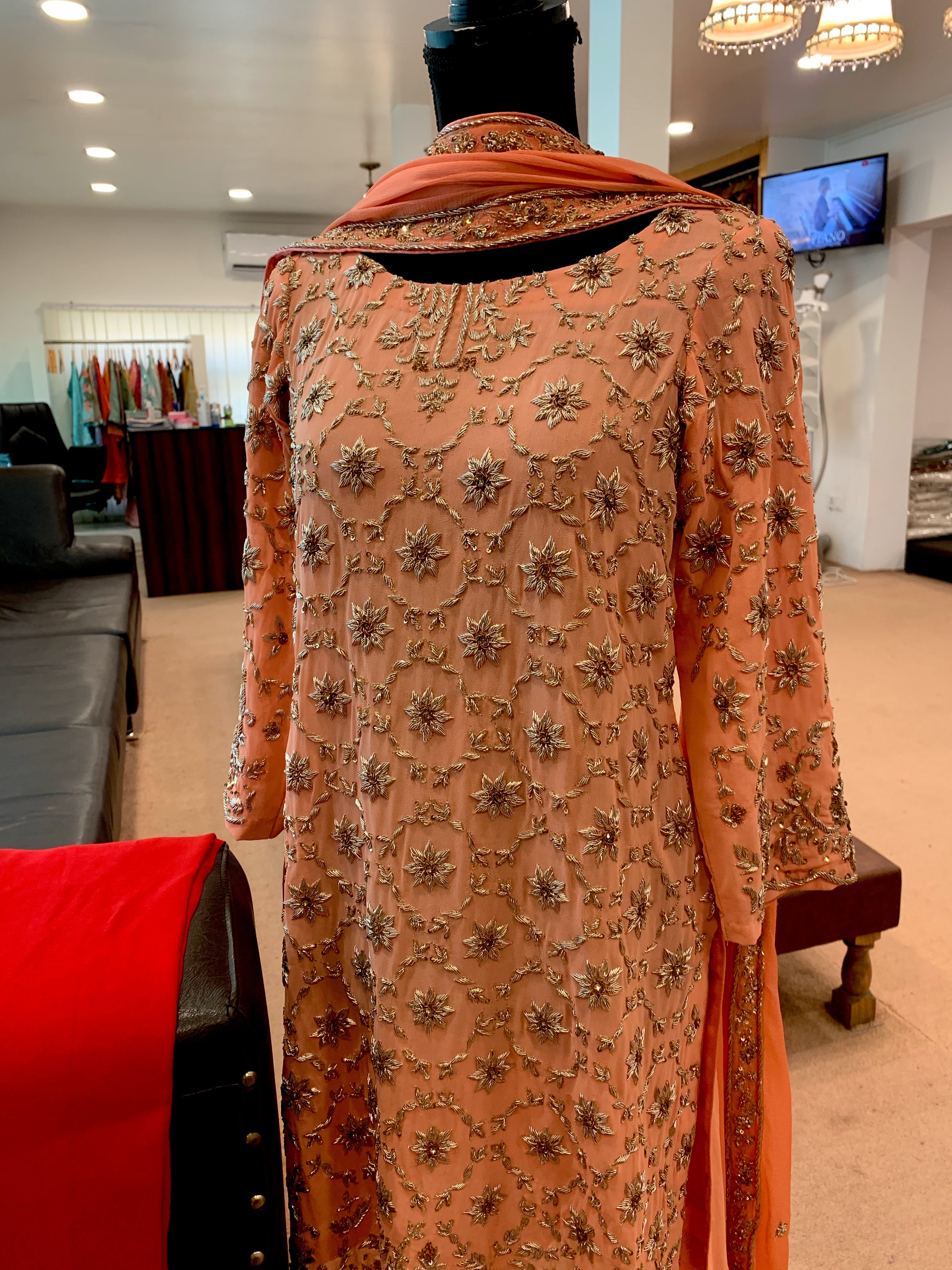 Hand embroidered suit stitched