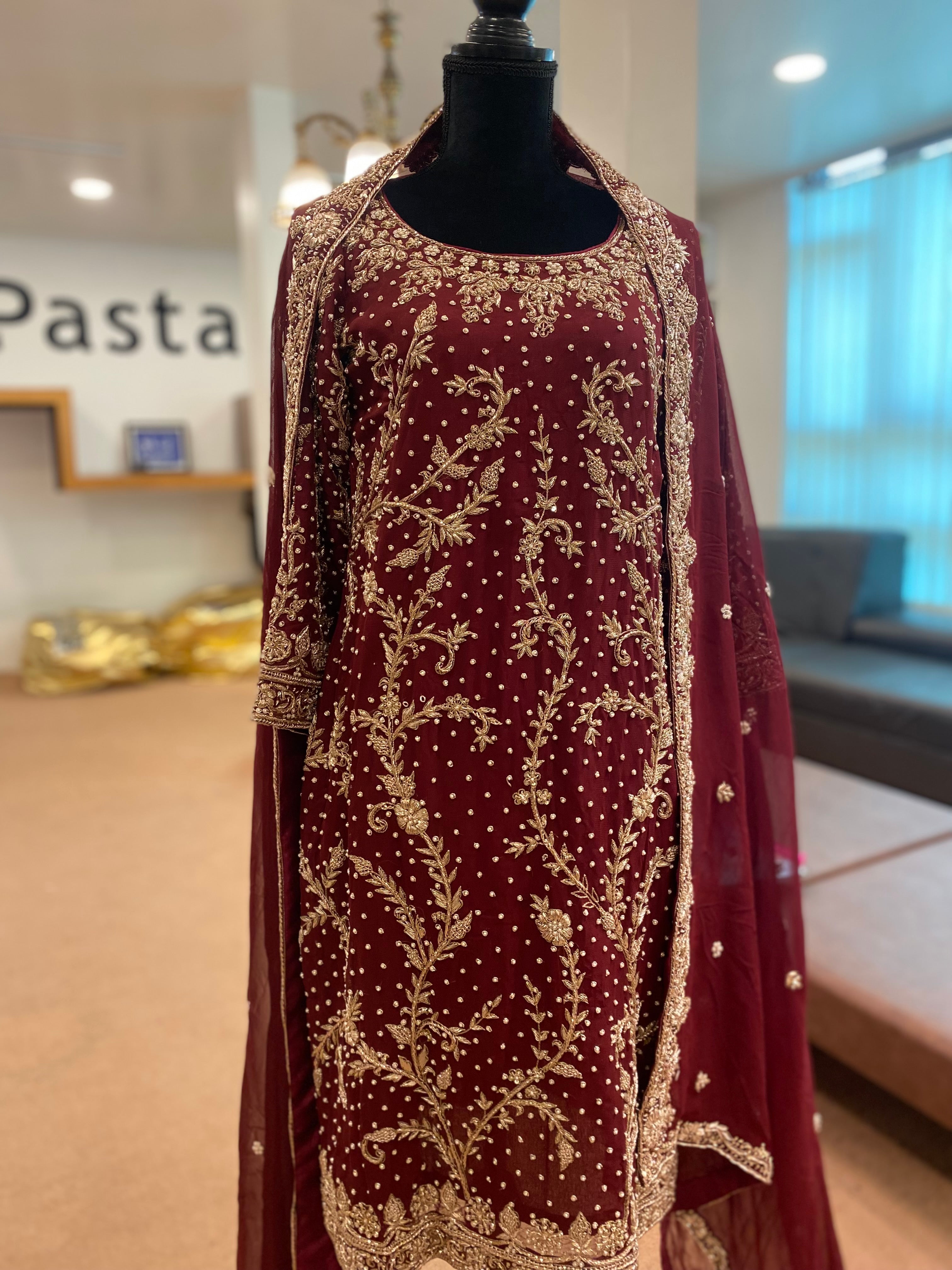 Handembroidered Bridal ensemble with trail skirt