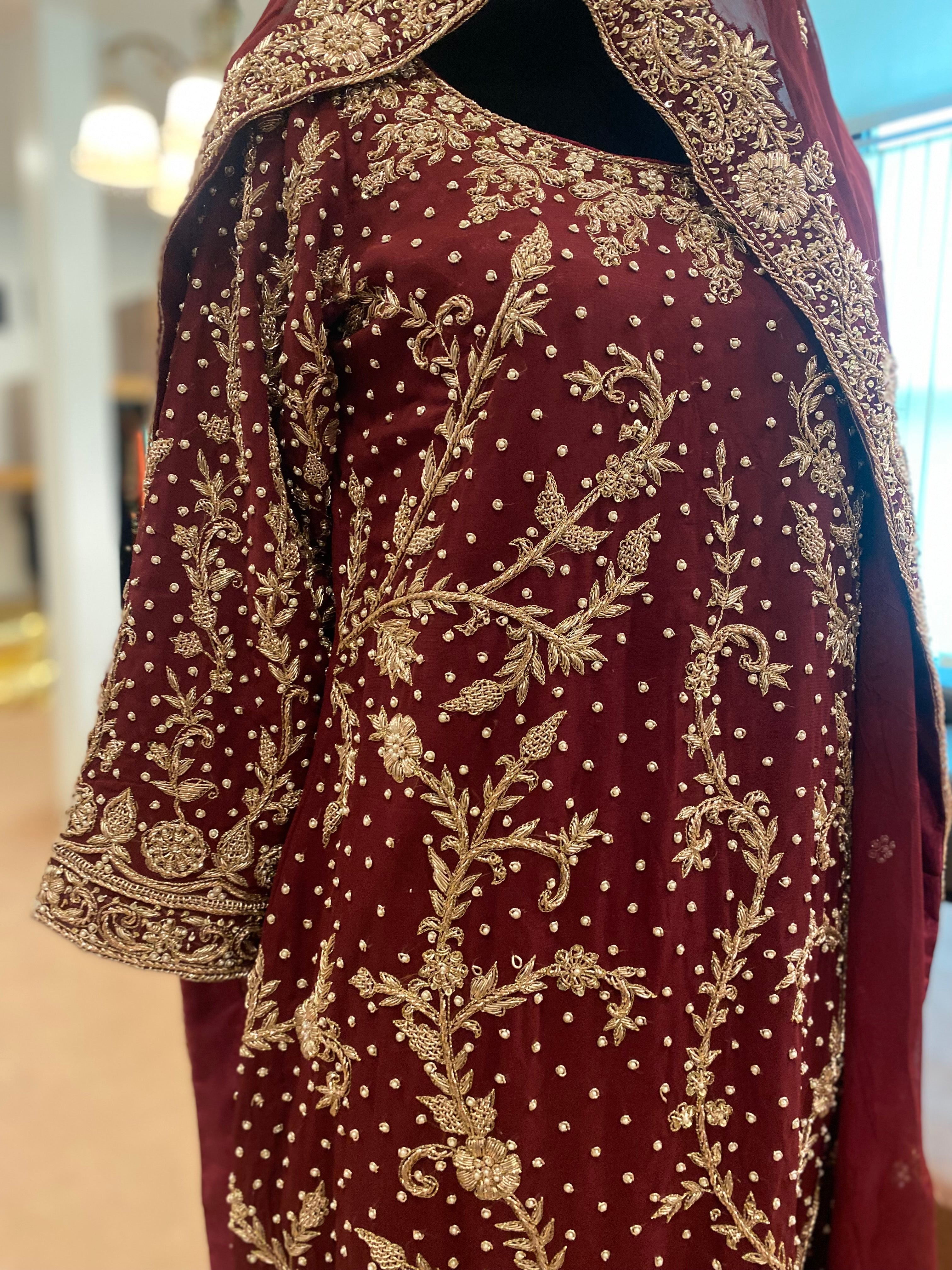 Handembroidered Bridal ensemble with trail skirt