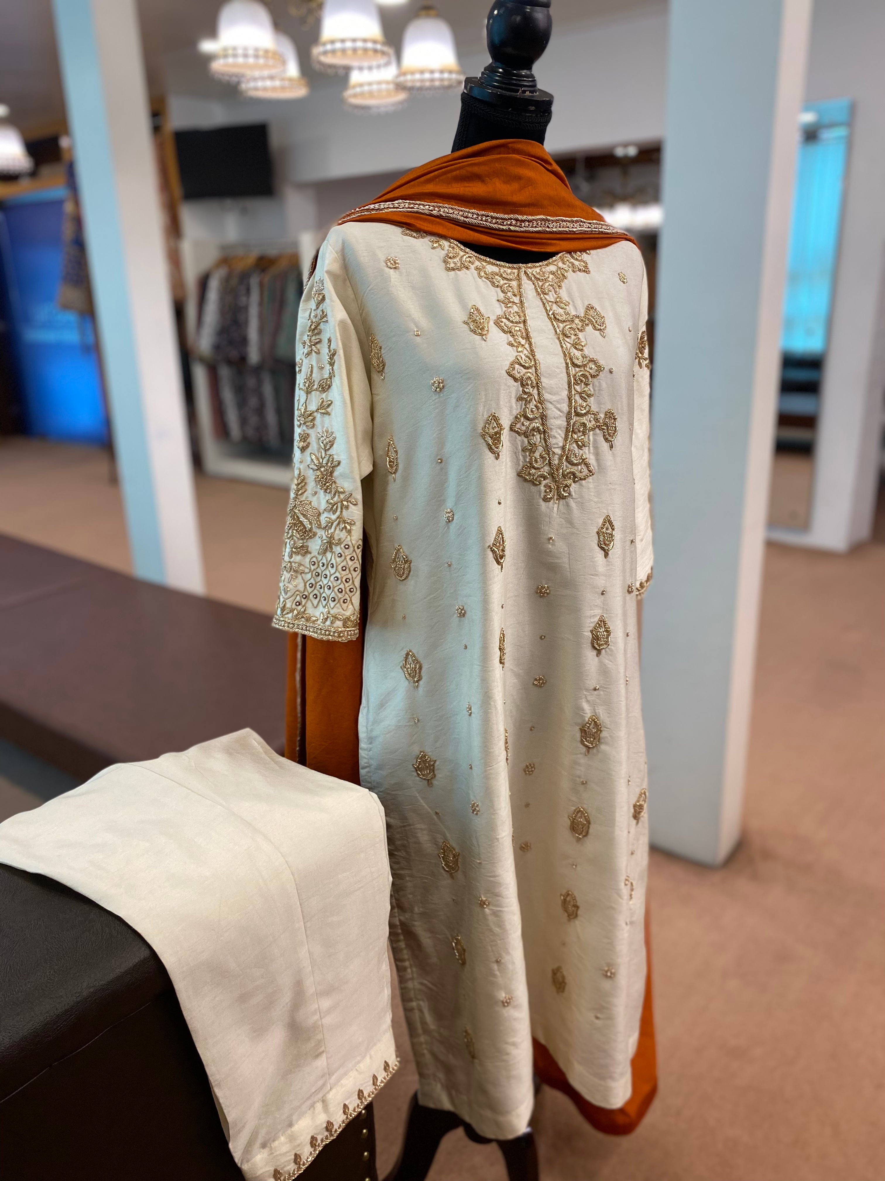Hand embroidered Off white suit with rust duppata