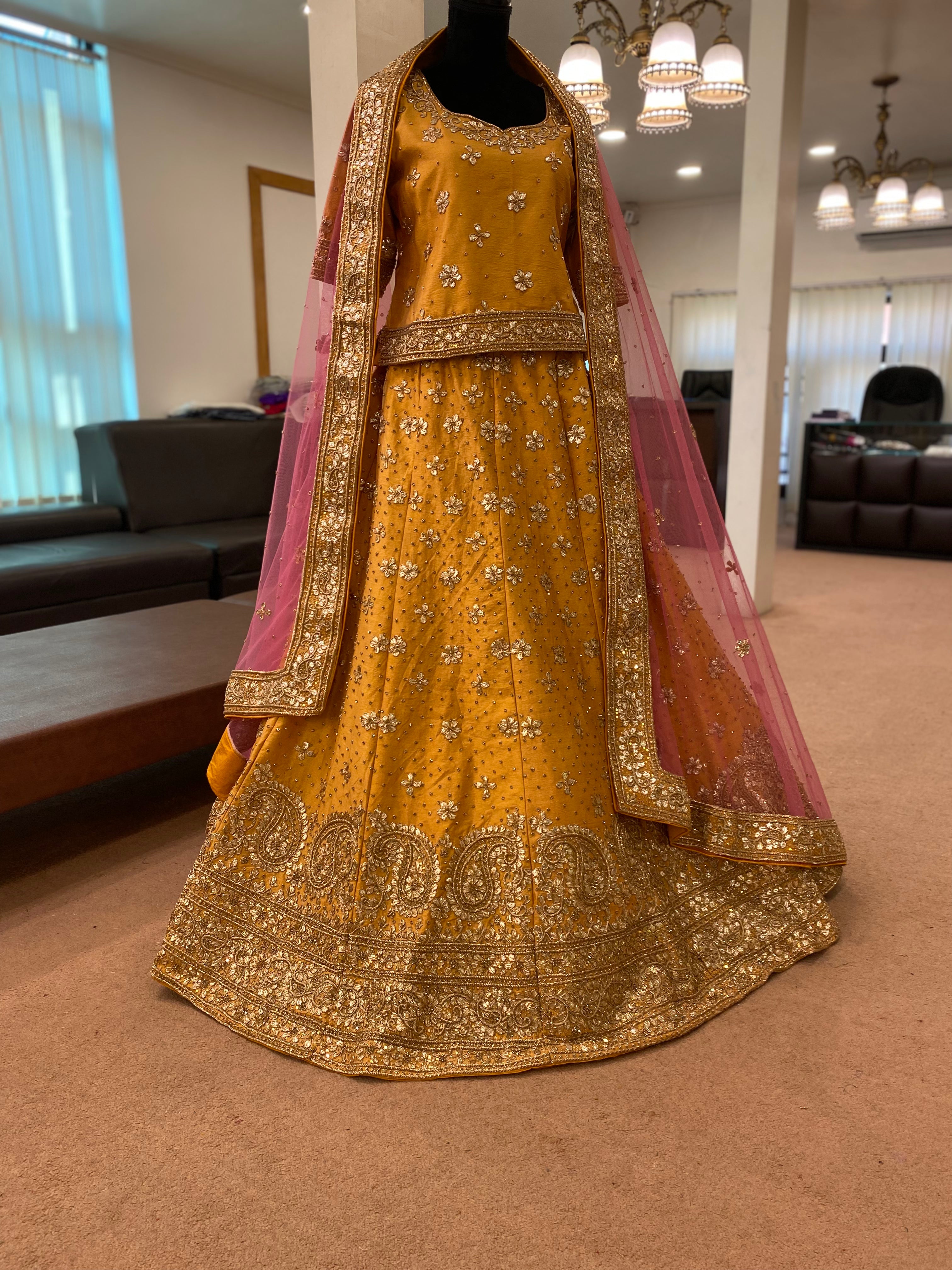 Hand embroidered golden and pink lehanga